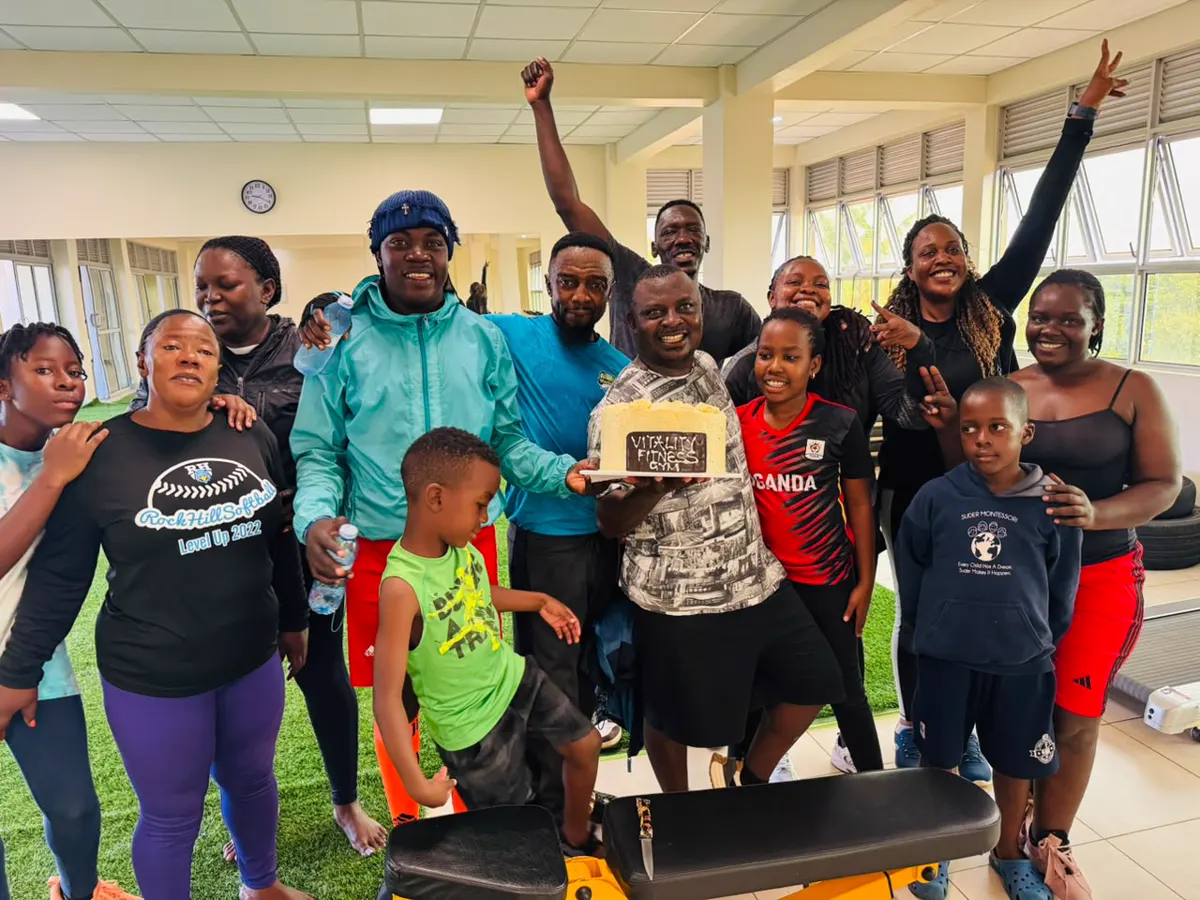 The class gathered around a birthday cake after a session